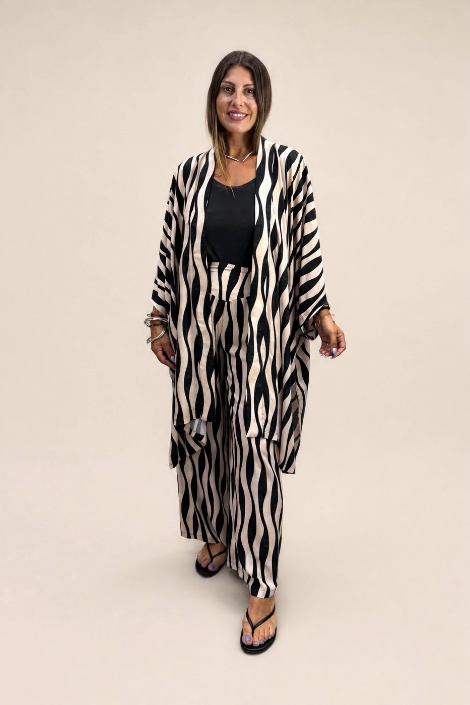 Tag Modest Clothing Polycaste pants styled with Florida Zebra Waves outerwear