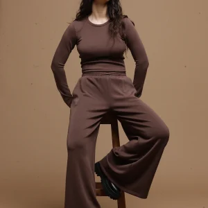 wide leg chocolate pants women Tag Modest Clothing Paullo Pants seated view