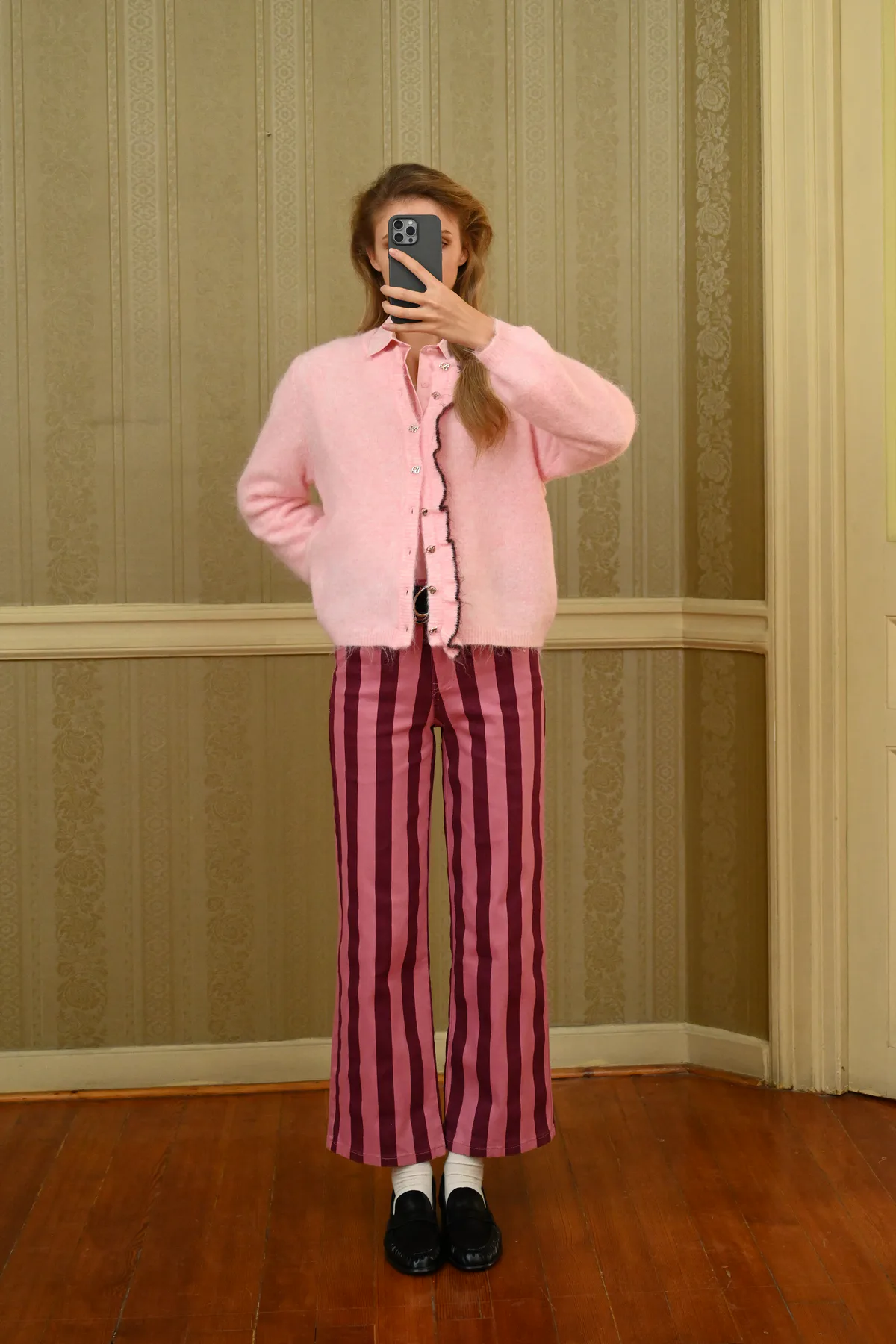 Boom Birdie rose pink cardigan styled with Bahia pink striped pants, full-length front view