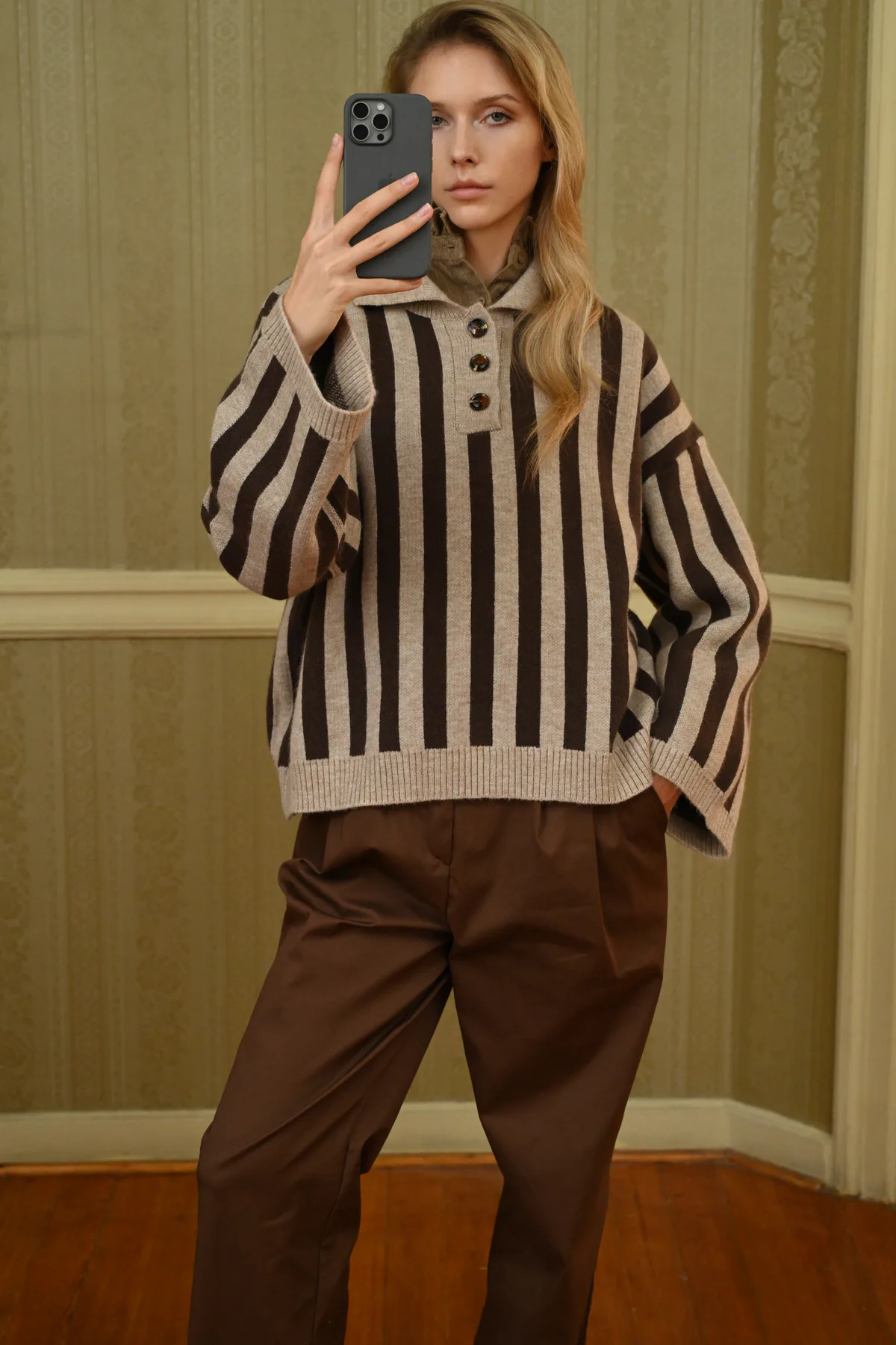 Boom Hollis Cookie striped polo top showing three-button placket, wide sleeves and ribbed hem, close-up