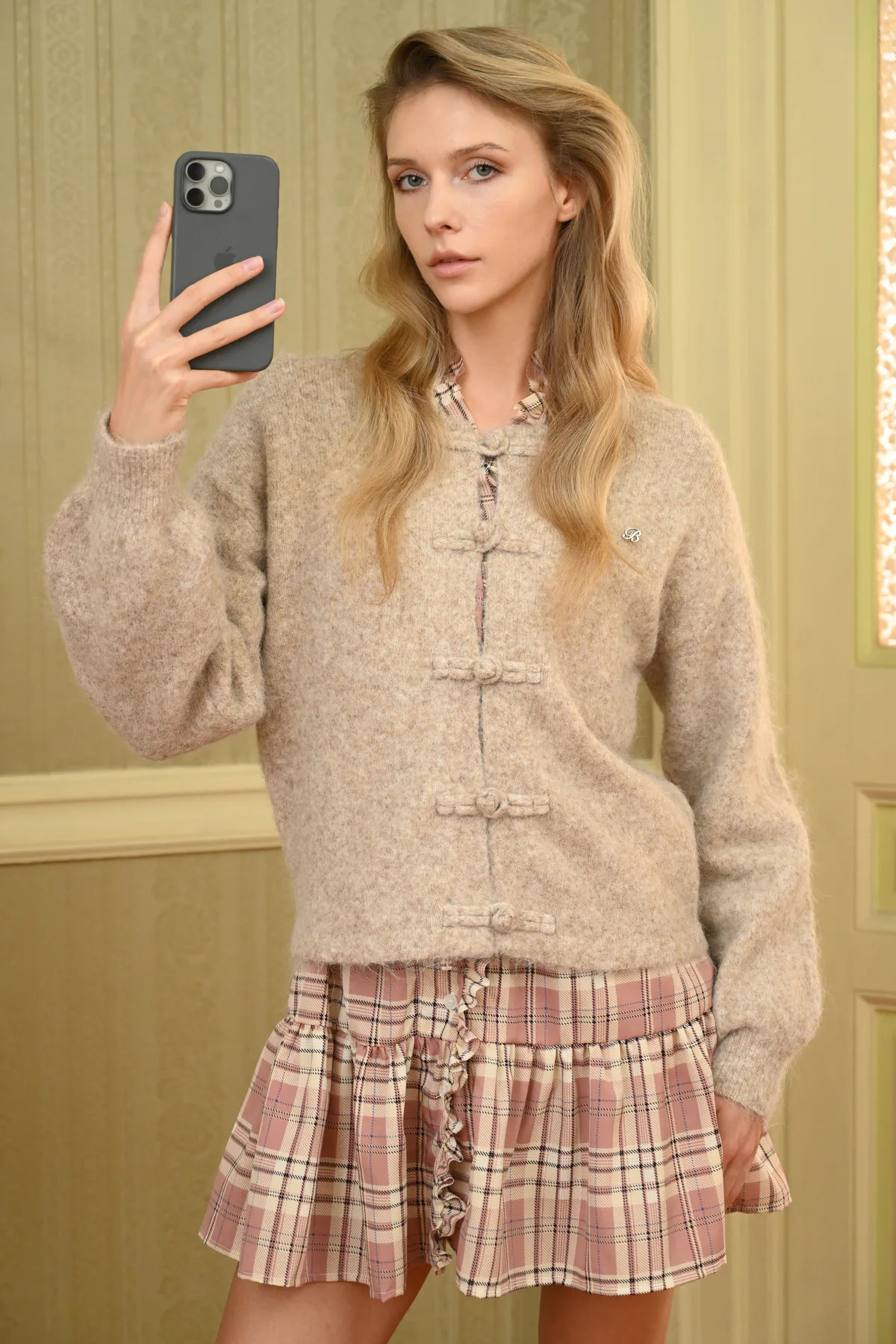 Boom Loulou beige cardigan with knotted loop fastenings and metallic B monogram, front close-up