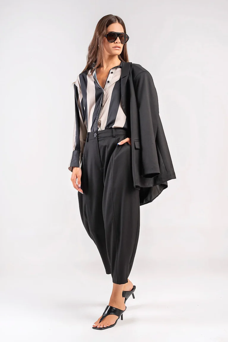 Teta Arvanitaki Bella Black Shirt with black and light beige stripes, styled with black trousers and a blazer draped over one shoulder