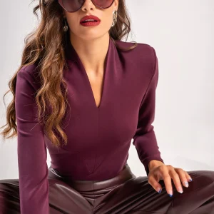 Teta Arvanitaki Ginger Purple Blouse, seated front view showing the fitted silhouette and long sleeves