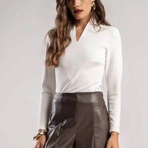 Teta Arvanitaki Ginger White Blouse, close front view showing the V-neckline and decorative front seams.