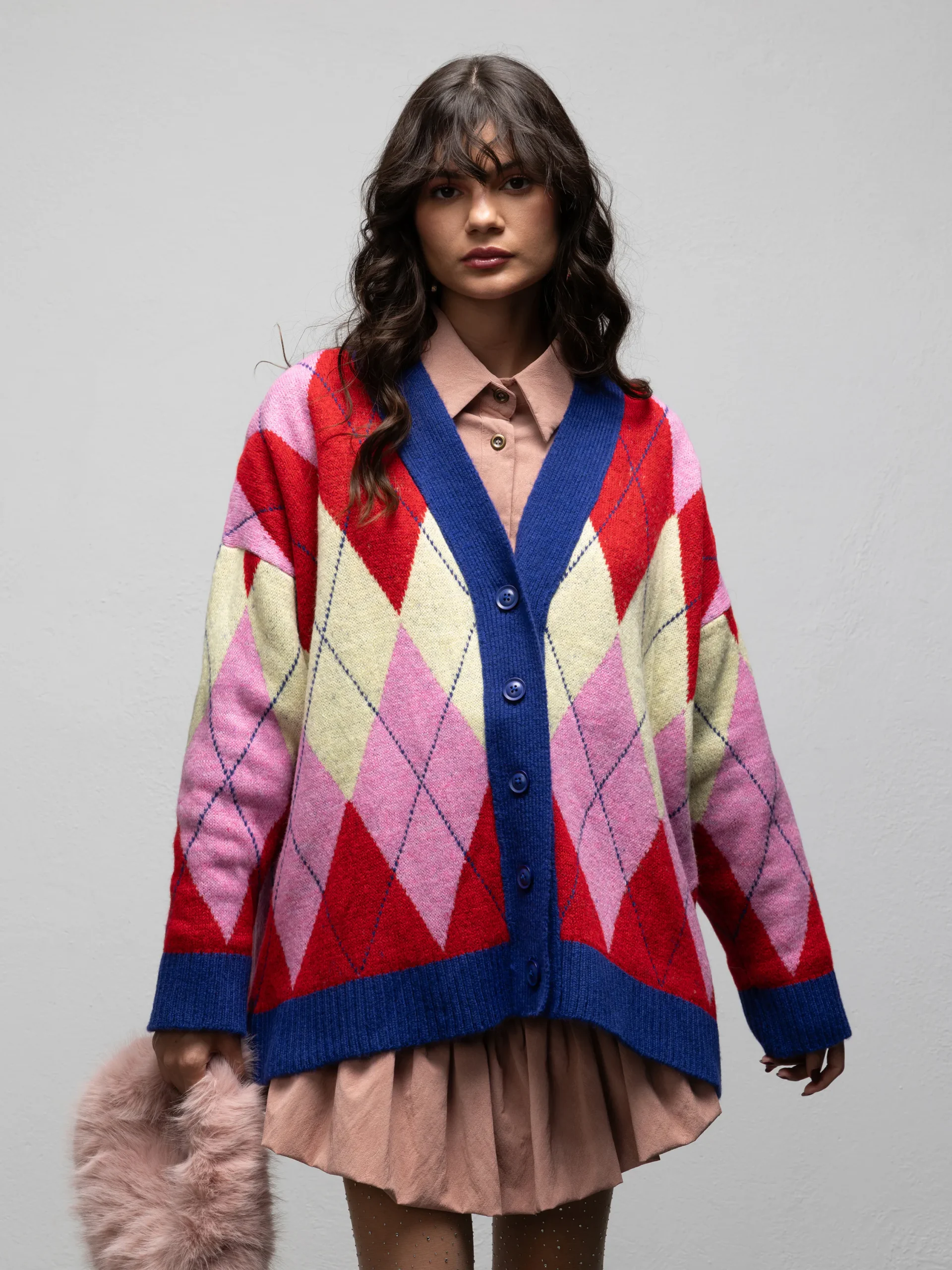 Paloma Diamond Pink cardigan by We Are, front view showing the V-neckline, button fastening and blue ribbed cuffs and hem