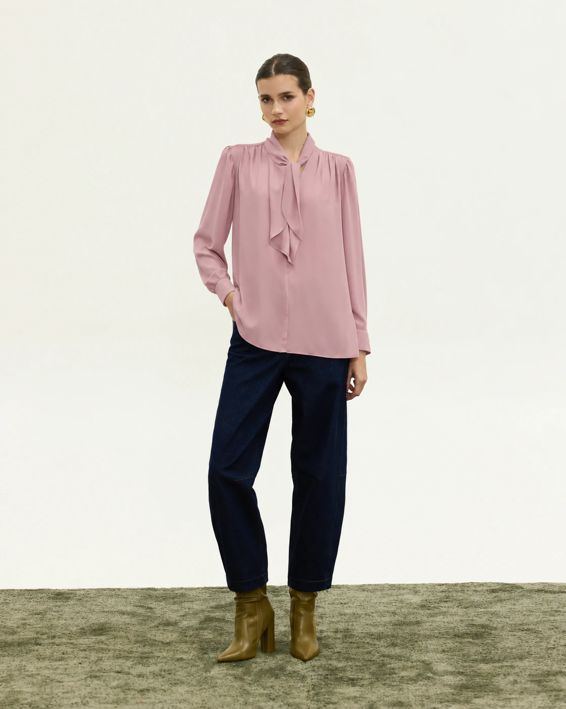 Innocent Estelle Tie-Neck Top in dirty pink on model, front view showing neck tie and long sleeves